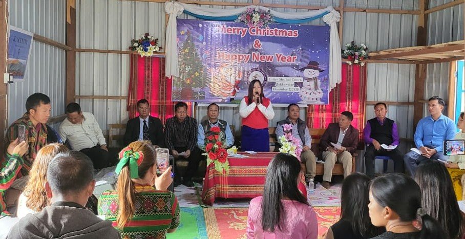 Deputy Executive Director speaking at Christmas Program